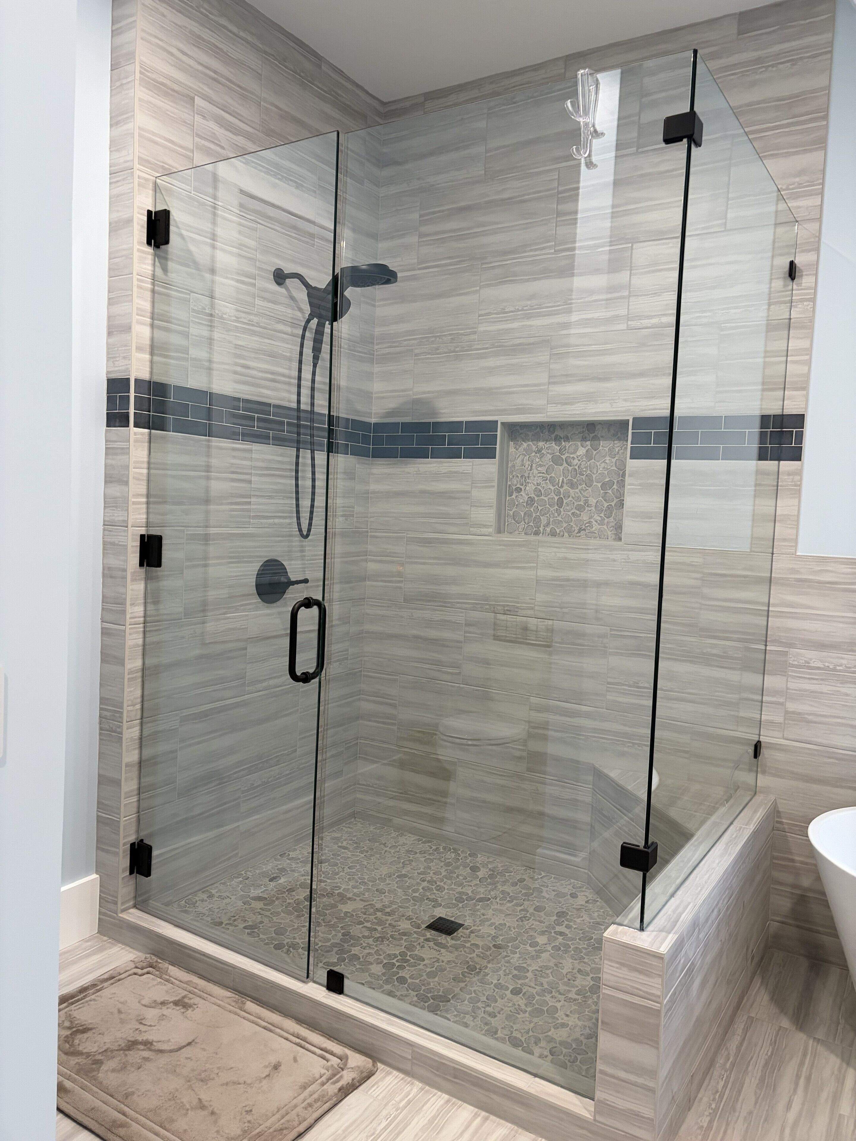 New shower w bench- remodeling project completed 3/26