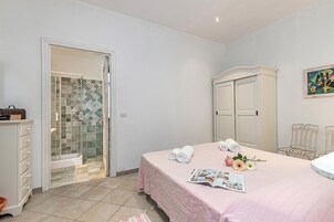 Family Apartment, Multiple Bedrooms, 2 Bathrooms (Domos Pintadas Apt. 3 Porto Rotondo) | 1 bedroom, iron/ironing board, free WiFi, bed sheets