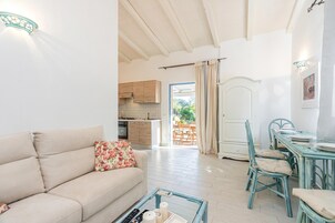 Casa familiar, 1 habitación, 2 baños (Domos Pintadas Villetta Bianca) | Zona de estar | Una televisión
