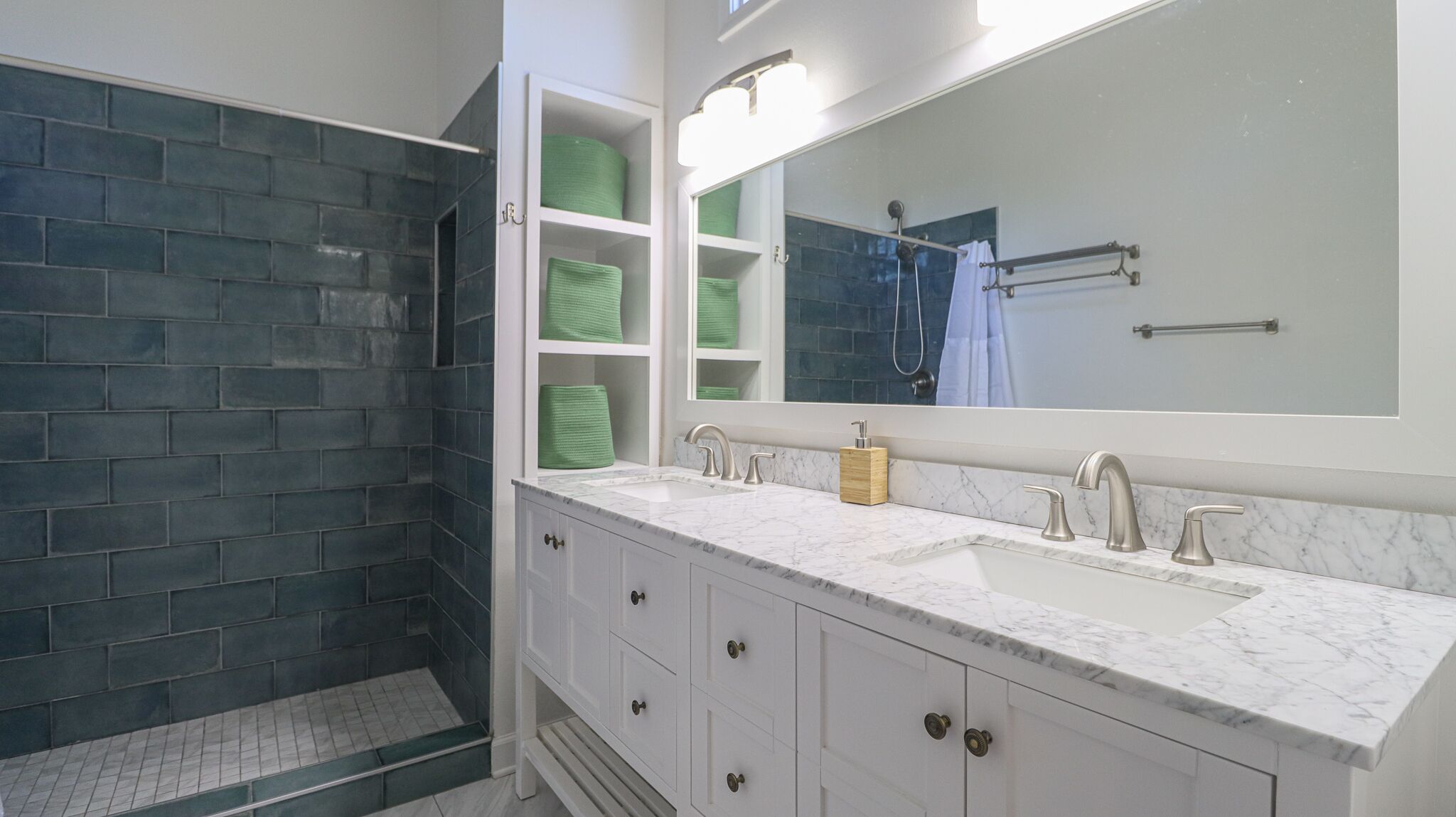 Combined shower/tub, hair dryer, towels, soap