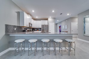 House, Multiple Beds (9 Bedroom Family Friendly Retreat - P) | Private kitchen | Electric kettle, toaster, dining tables - 9 Bedroom Family Friendly Retreat - Private Pool (Davenport)