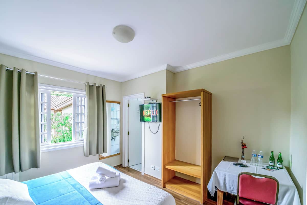 Executive kamer | Een minibar, verduisterende gordijnen, gratis wifi, beddengoed