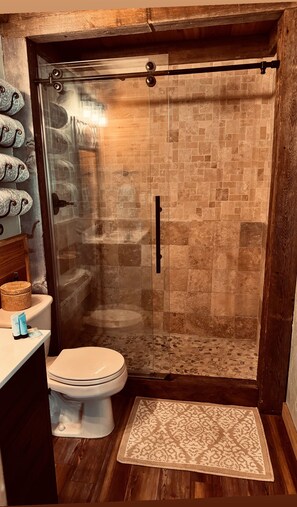 Bathtub, hair dryer, towels, soap