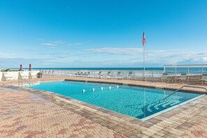 Outdoor pool, a heated pool - WEEKLY SUMMER SPECIALS! Oceanfront Condo - Heated Pool - NO DRIVE BEACH (Daytona Beach Shores)