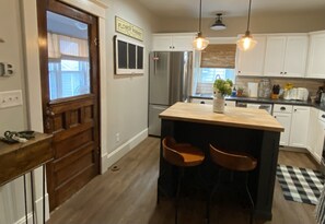 Dishwasher, blender, dining tables
