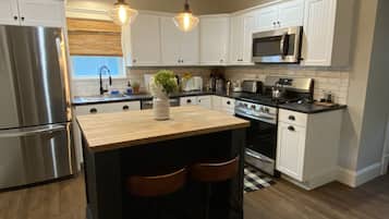 Dishwasher, blender, dining tables