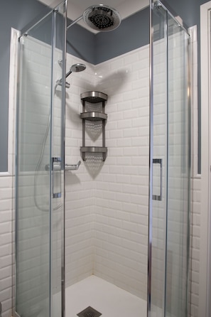 Shower, hair dryer, towels, toilet paper