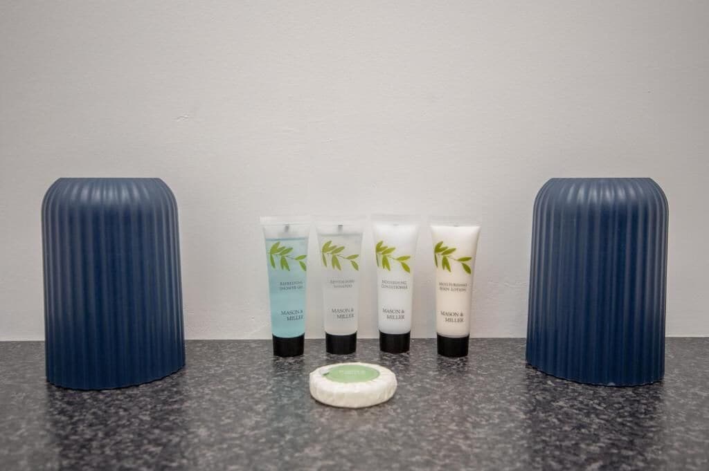 A set of skincare products on a countertop.