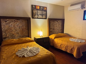 Habitación doble familiar | Ropa de cama