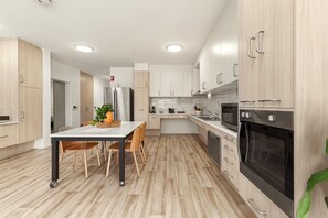 Deluxe Apartment, Accessible, Non Smoking | Private kitchen | Full-size fridge, microwave, oven, stovetop