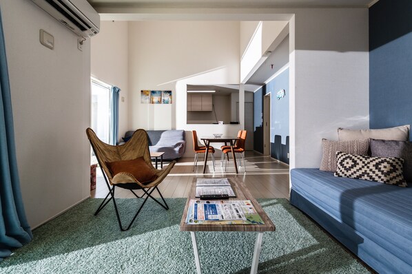 Unit B | Living area | 24-inch TV with digital channels - Chura Palace (Motobu)