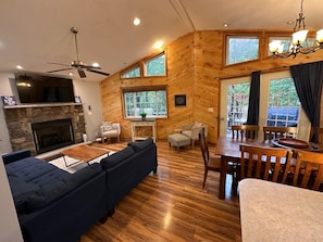 Smart TV, fireplace, table football, books