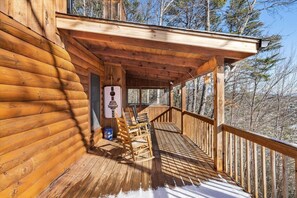 Sit on the covered porch and enjoy the serene surroundings.