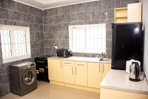 House | Private kitchen | Fridge, microwave, oven, stovetop - White House Luxury Mansion With a Difference (Brufut)