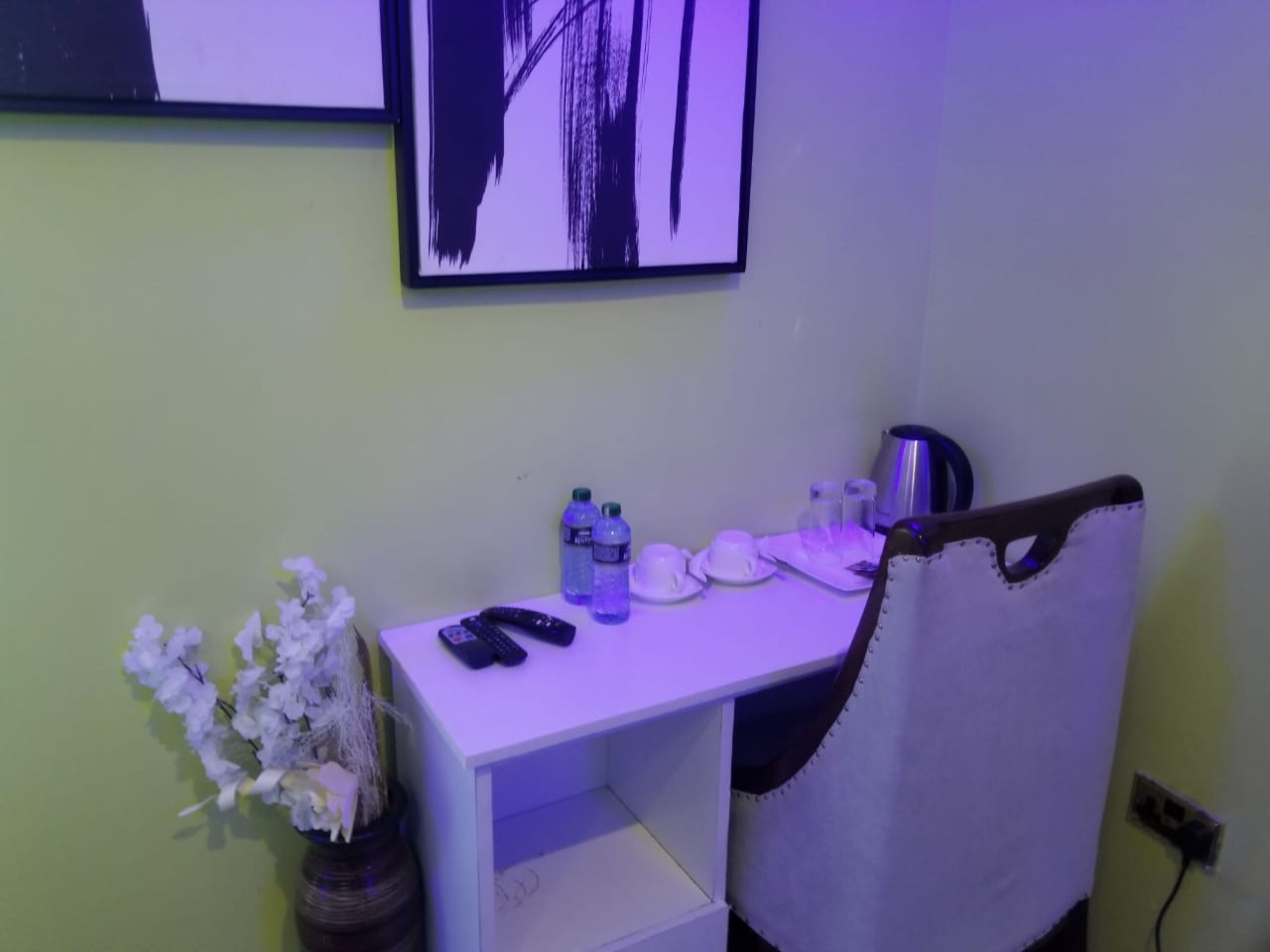 desk, laptop workspace, bed sheets