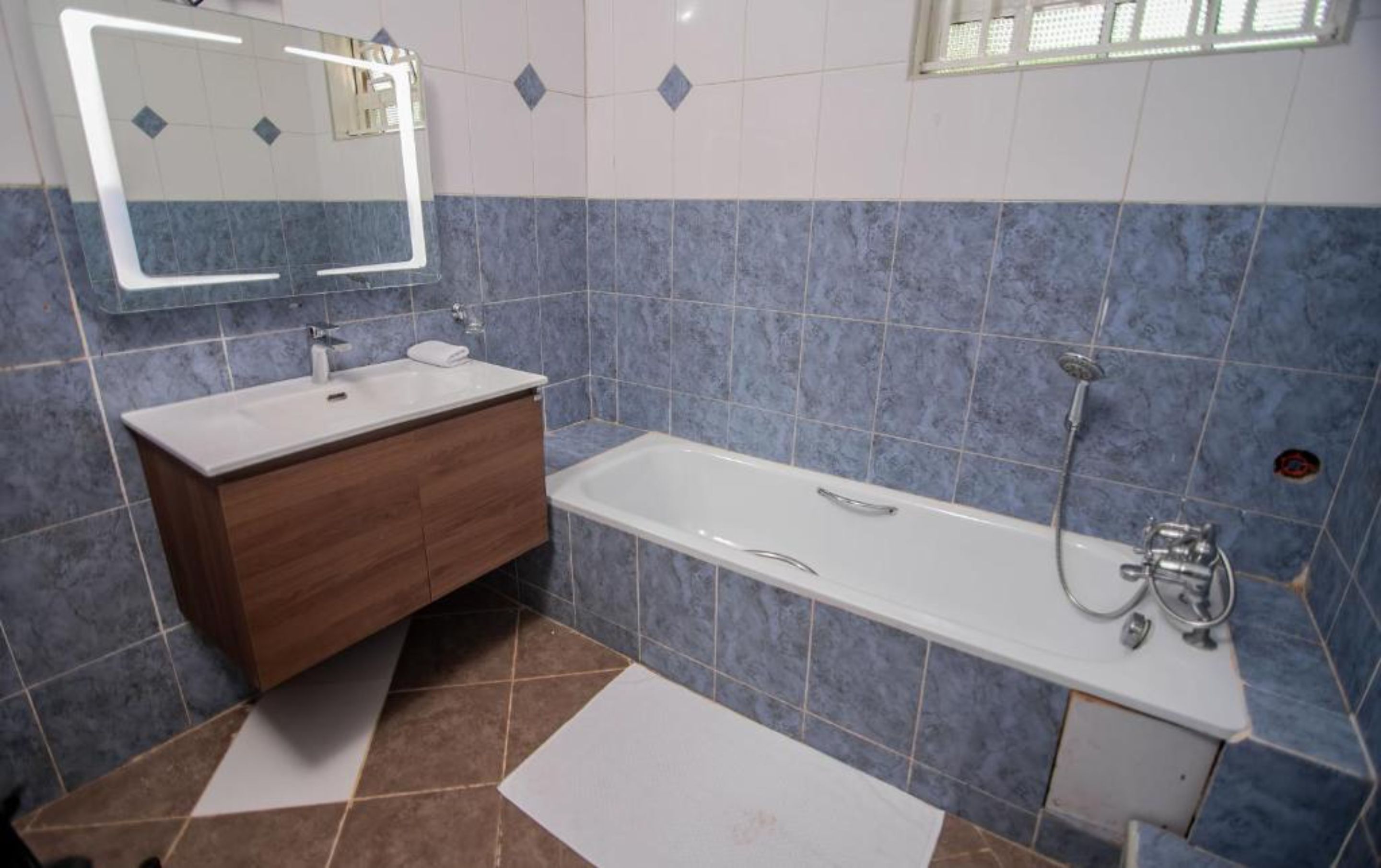 superior room | bathroom | shower, slippers, towels