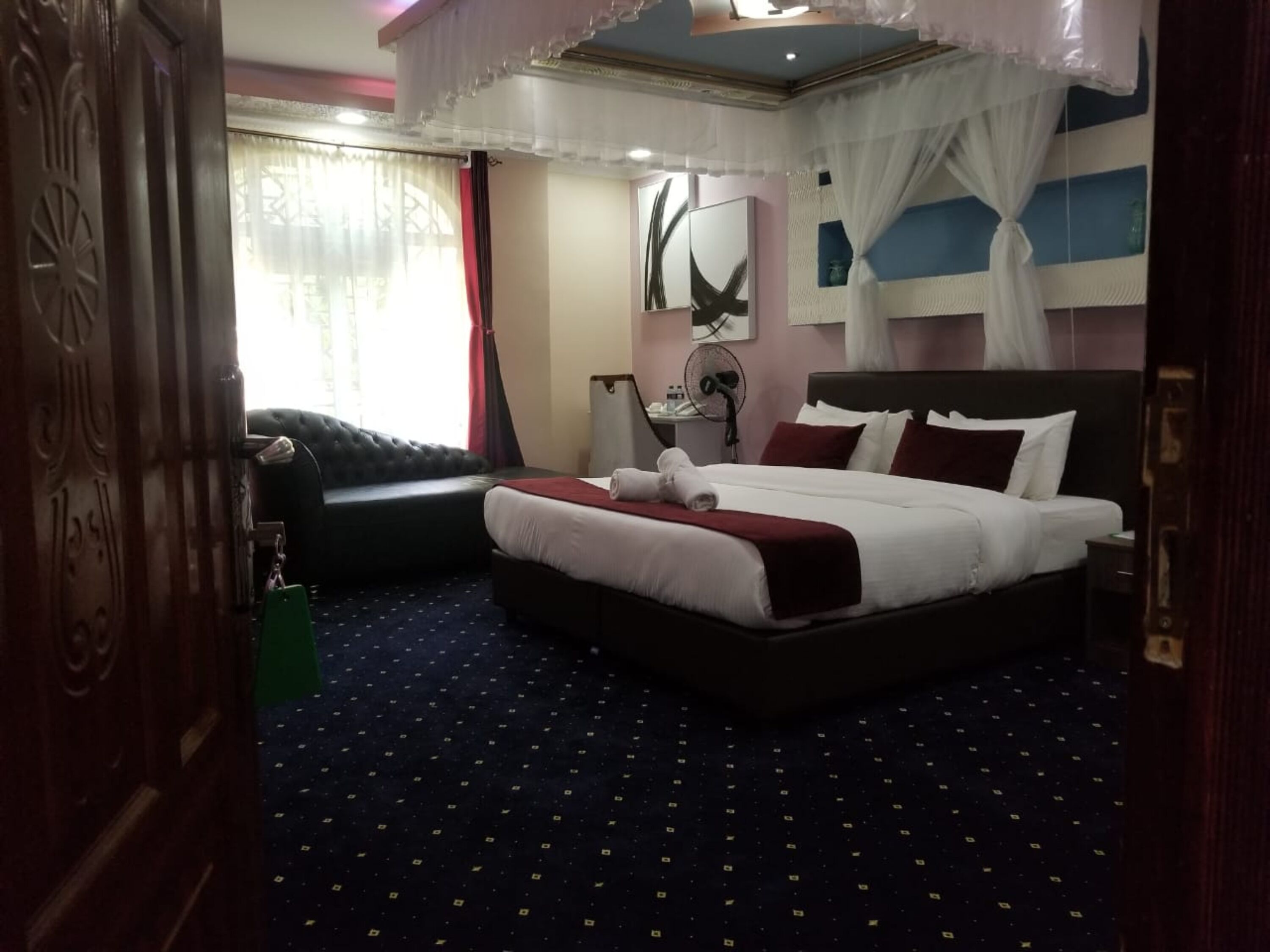 superior room | desk, laptop workspace, bed sheets