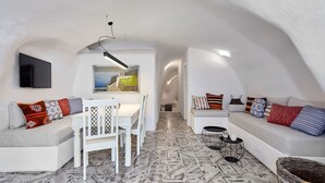Smart TV, Netflix, books, streaming services - Two Cave Houses with Private Garden Courtyard (Megalochori)