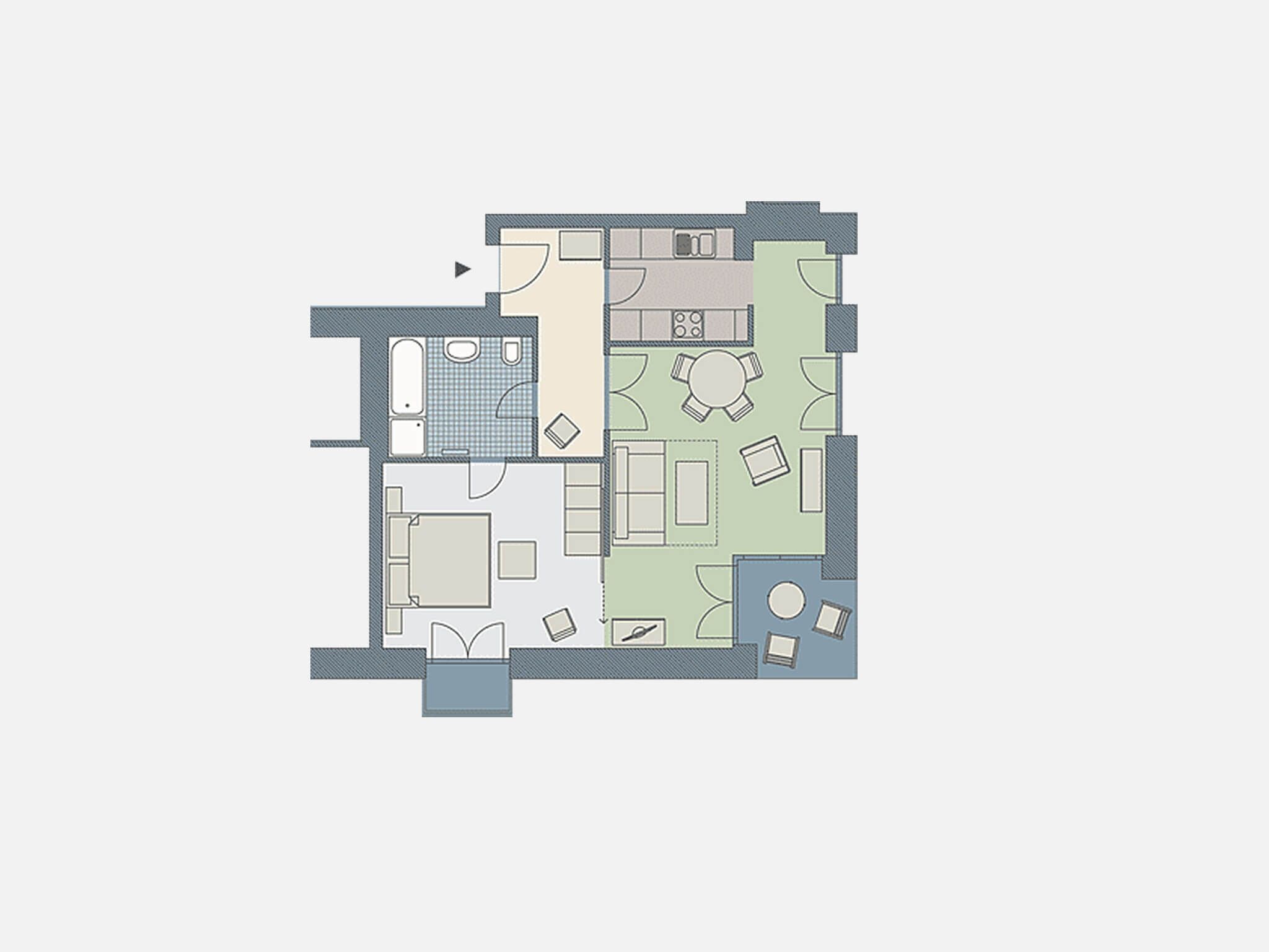 Een plattegrond van een hotelkamer met een badkamer, een eetgedeelte en een woongedeelte.