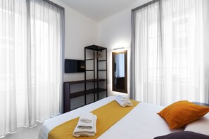 1 habitación, tabla de planchar con plancha, wifi y ropa de cama 