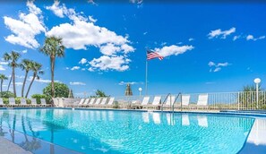 A heated pool, sun loungers