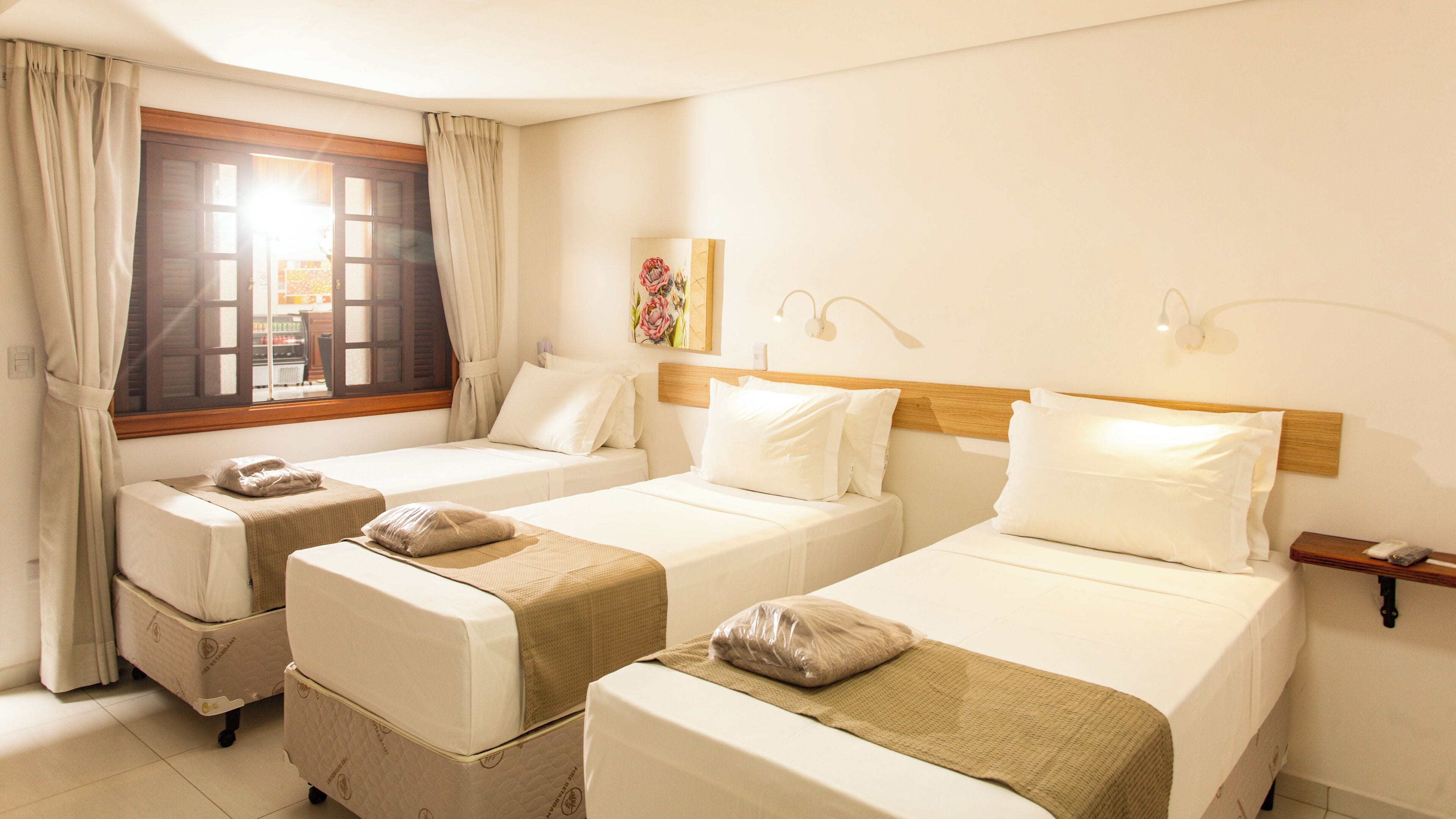 Executive Triple Room | Pillowtop beds, minibar, individually decorated, individually furnished