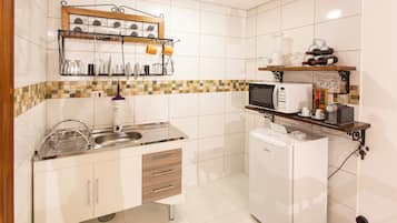Chambre Triple Exécutive | Cuisine privée