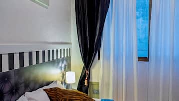 1 chambre, fer et planche à repasser, accès Internet, draps fournis