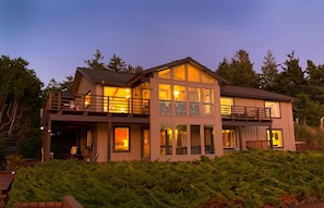 This incredible 5000-square-foot lake house features loads of outdoor spaces.