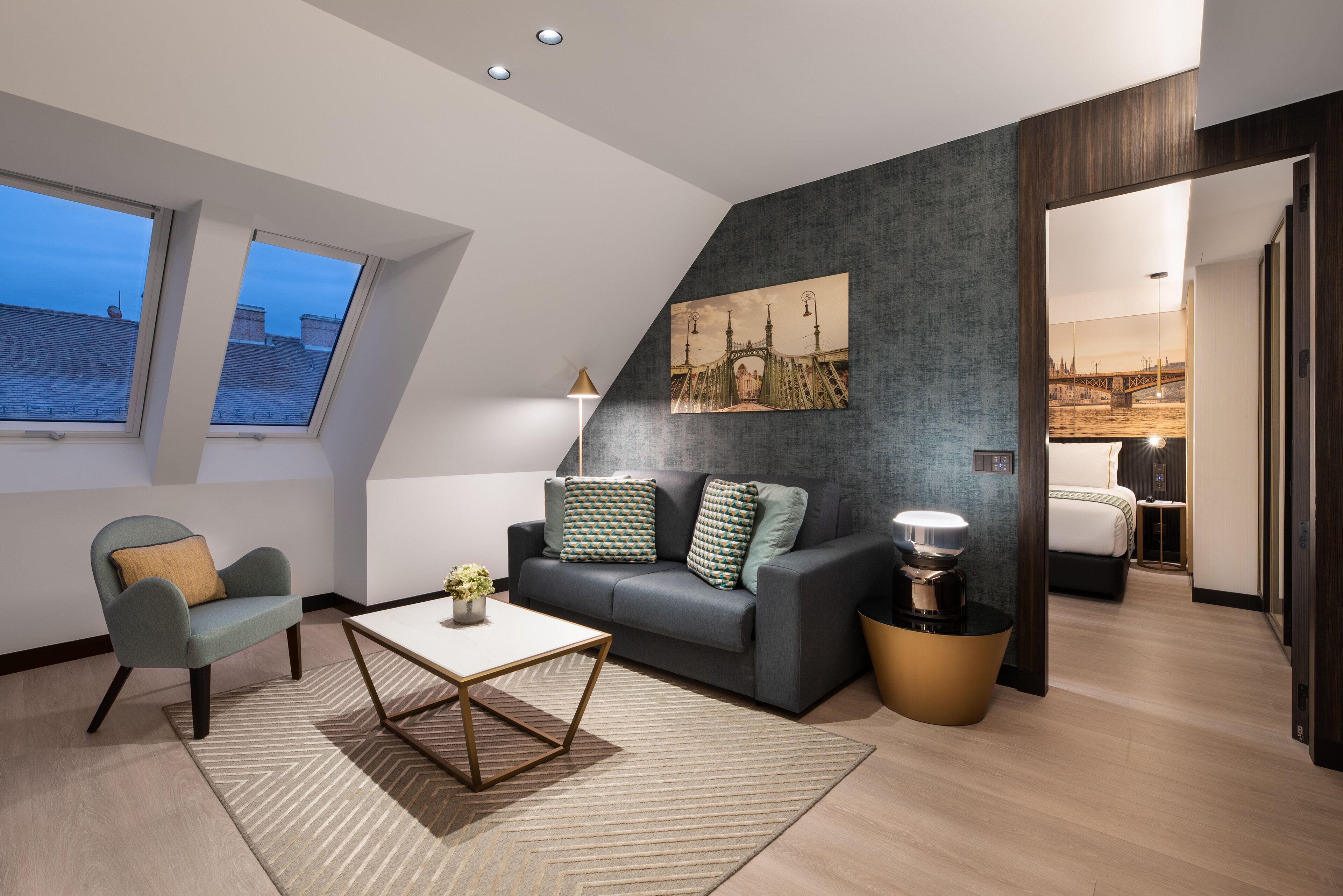 family room | down duvets, minibar, in-room safe, desk