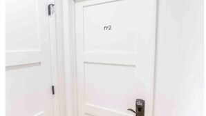 A white door with a keypad lock and a label 'n2'. - Historical Hotel, Main Street Blowing Rock (Blowing Rock)