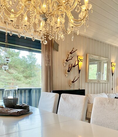 Cozy vacation home in southern Norway (Tromøy, Arendal) with a boat and a pier.