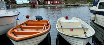 Cozy vacation home in southern Norway (Tromøy, Arendal) with a boat and a pier.