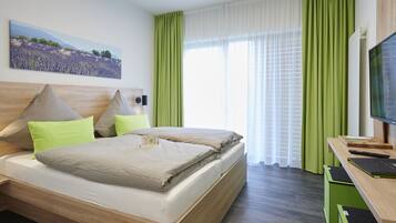 Habitación clásica doble | Ropa de cama hipoalergénica, cortinas opacas, sistema de insonorización