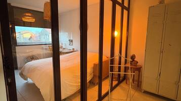 1 chambre, fer et planche à repasser, Wi-Fi gratuit, draps fournis