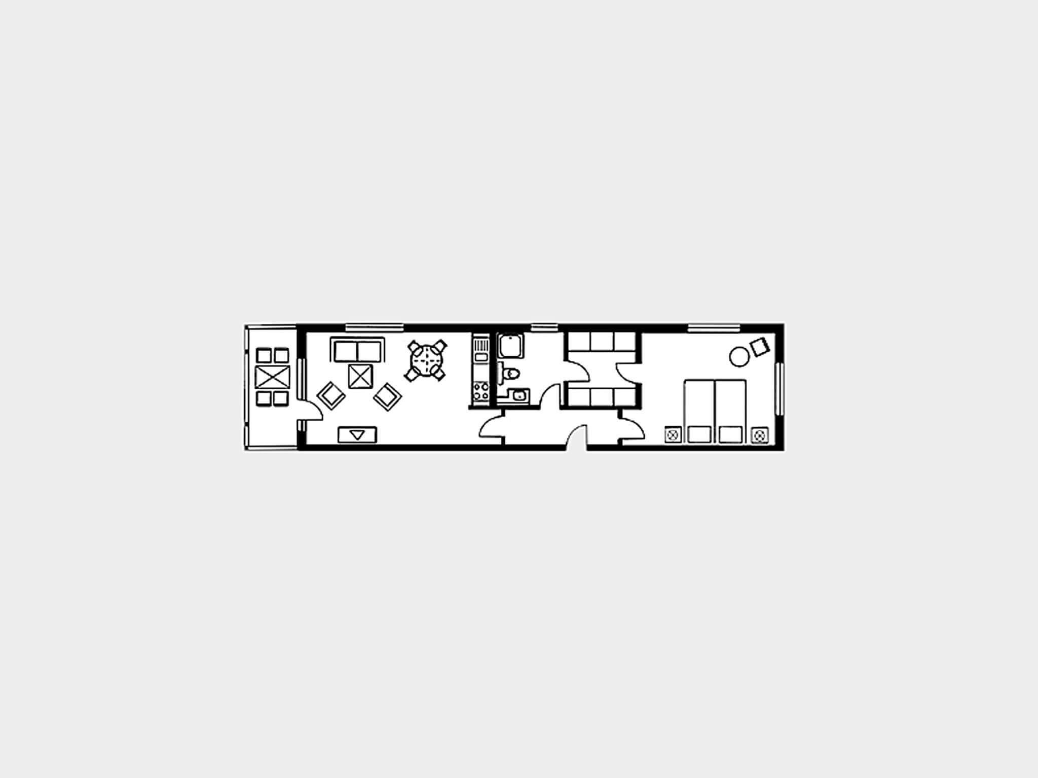 Plano de una habitación de hotel con kitchenette, comedor y baño.