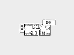 A floor plan of a hotel with a kitchen, dining area, and multiple bedrooms.