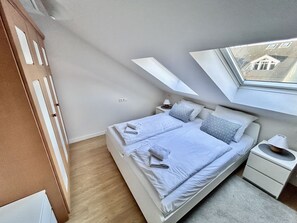 2 bedrooms, free WiFi, bed sheets - Comfort plus apartment with 2 bedrooms and balcony on the top floor (Ostseebad Binz)