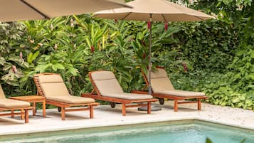2 outdoor pools, pool umbrellas, pool loungers