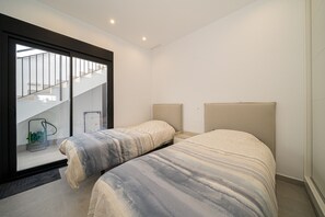 2 slaapkamers, een strijkplank/strijkijzer, gratis wifi, beddengoed