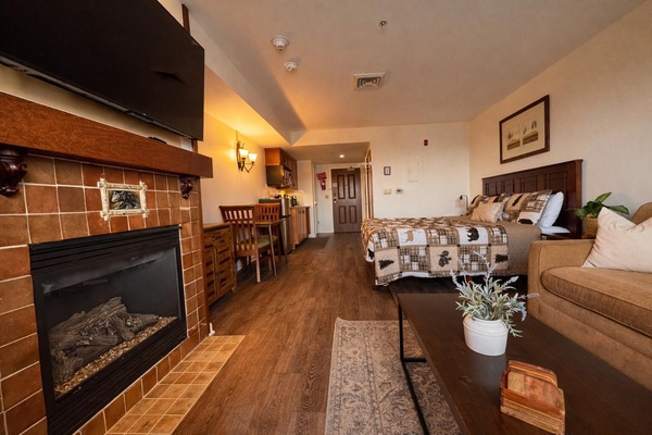 Cozy living room with fireplace and rustic charm