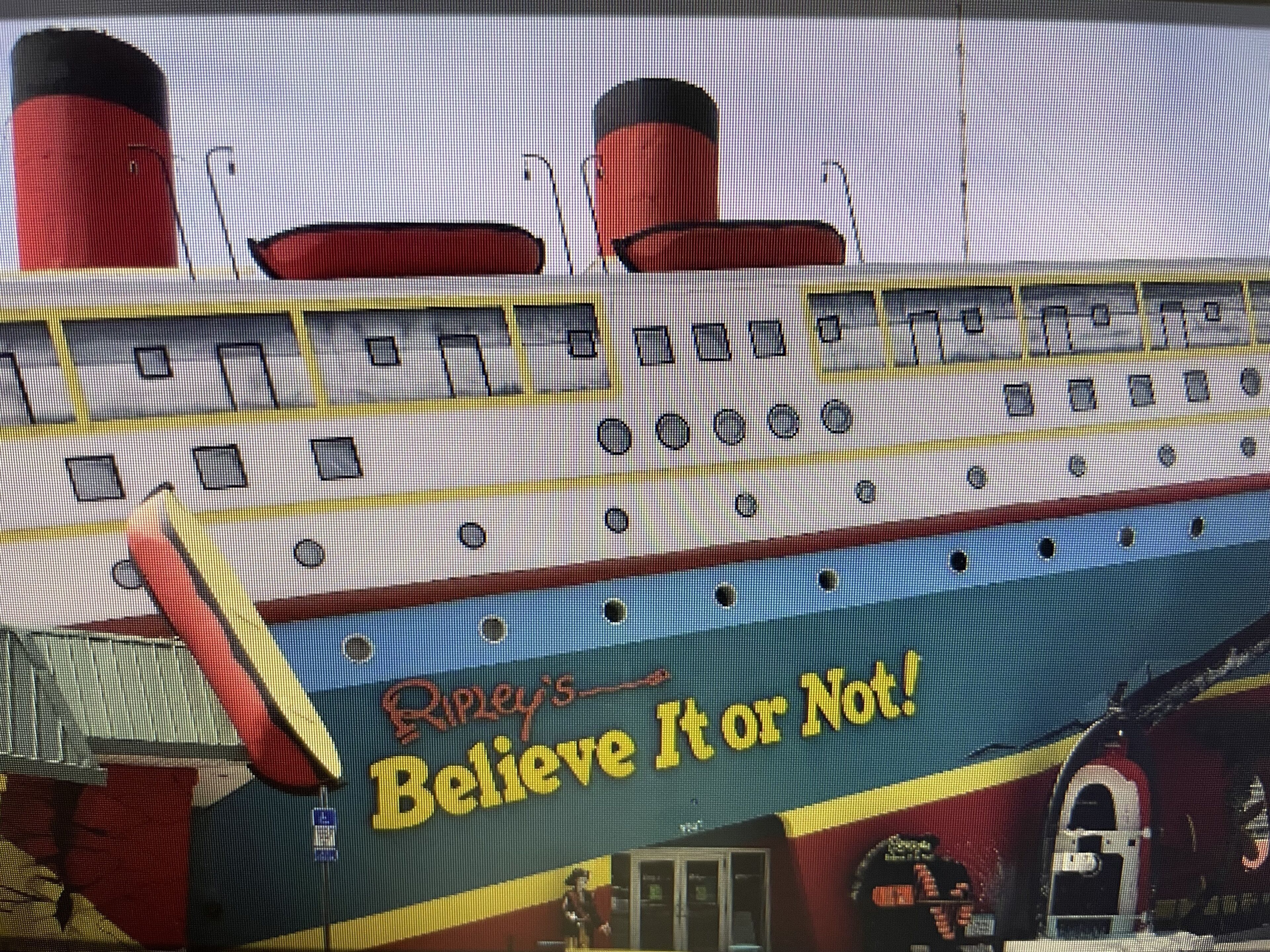 A large ship with the text "Ripley's Believe It or Not!" on its side.
