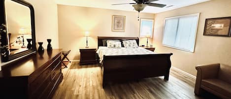 1 bedroom, desk, iron/ironing board, travel crib