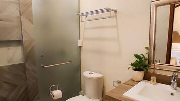 Shower, rainfall showerhead, towels, soap