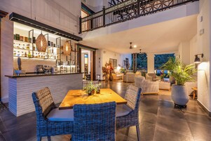 Breakfast, lunch, dinner served; international cuisine, pool views 