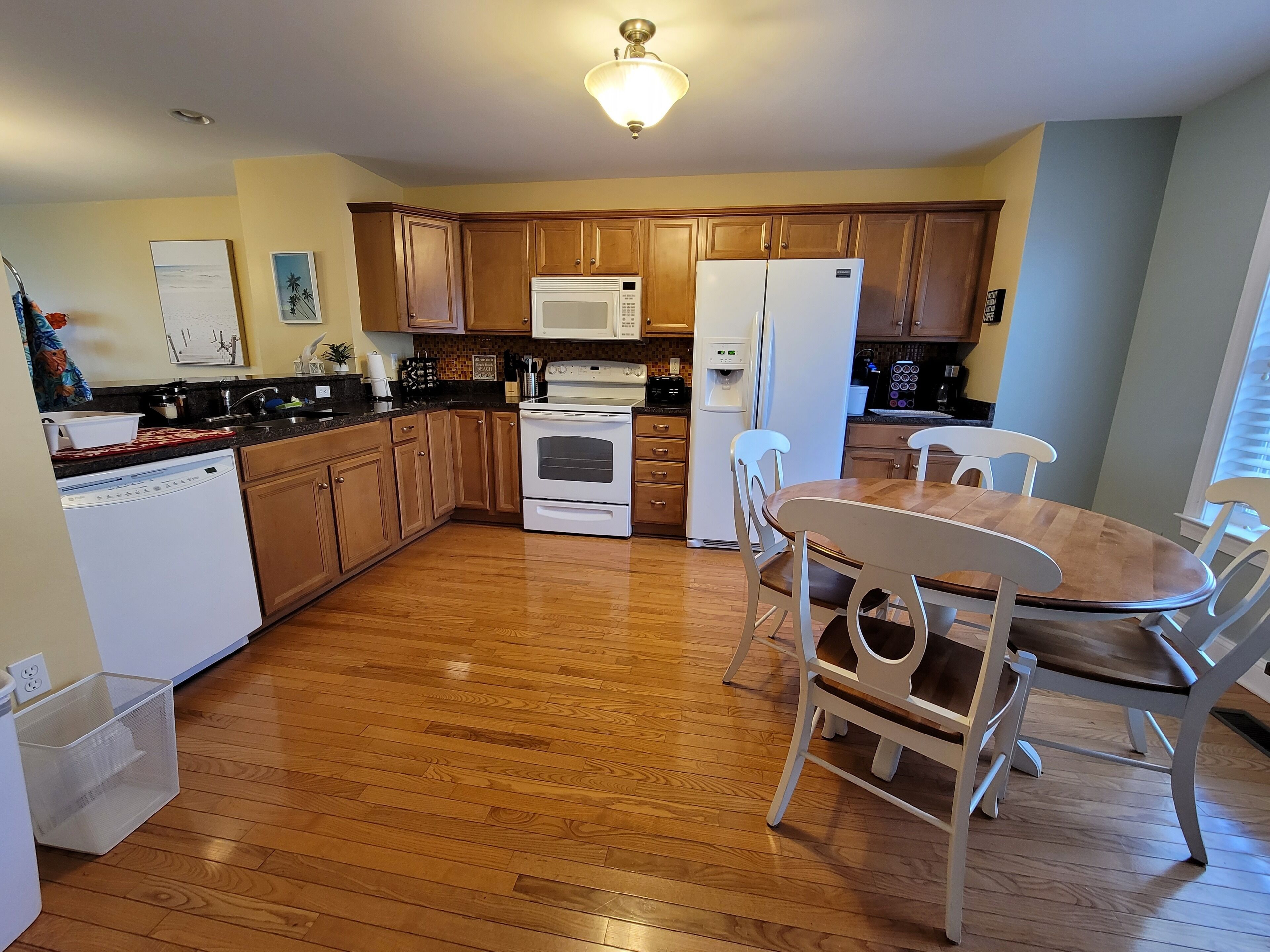 The fully-stocked kitchen (BYO food and drink) has spices and a coffee bar.