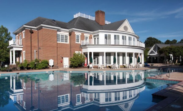 Enjoy a view of the surrounding area from the curved balcony with multiple windows.