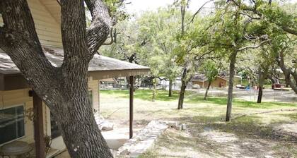house and lighted deck fenced yard