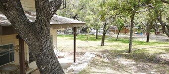 house and lighted deck fenced yard