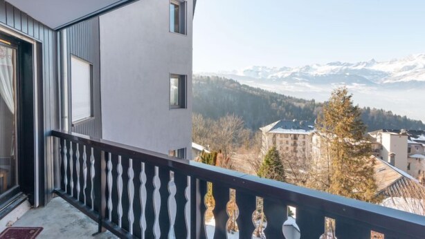 A balcony with a view of a mountainous landscape. - Bel Alp 23 by Interhome (Saint Gervais)